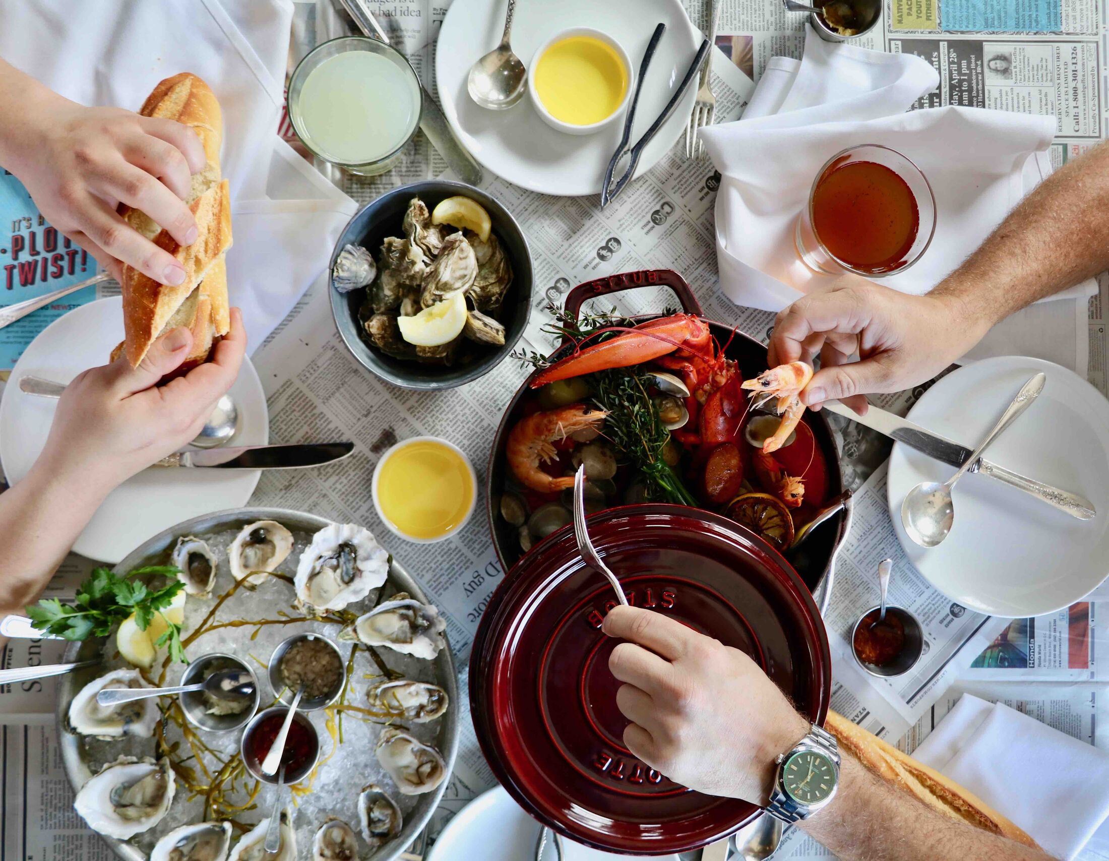 A full table of oysters, lobster and chilled seafood at Fishing with Dynamite